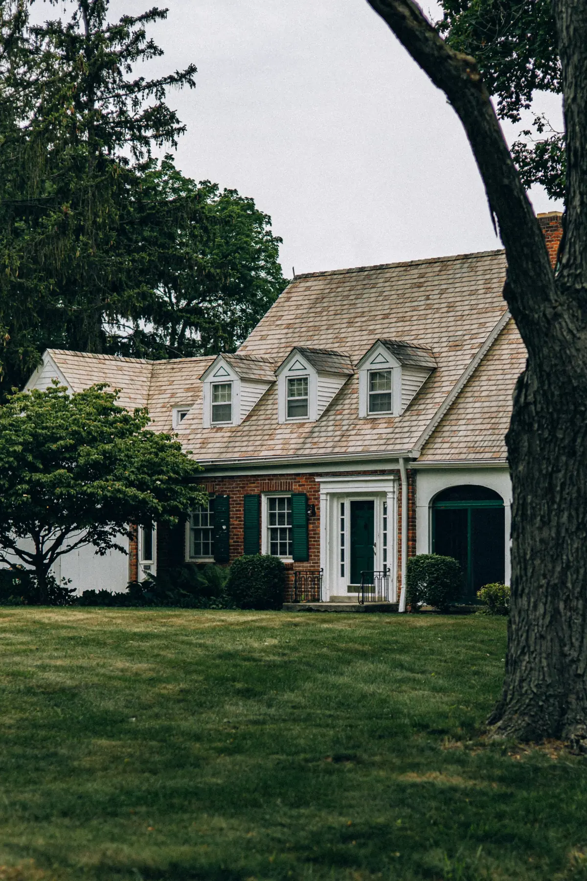 Classic brick house with repaired exterior after storm damage