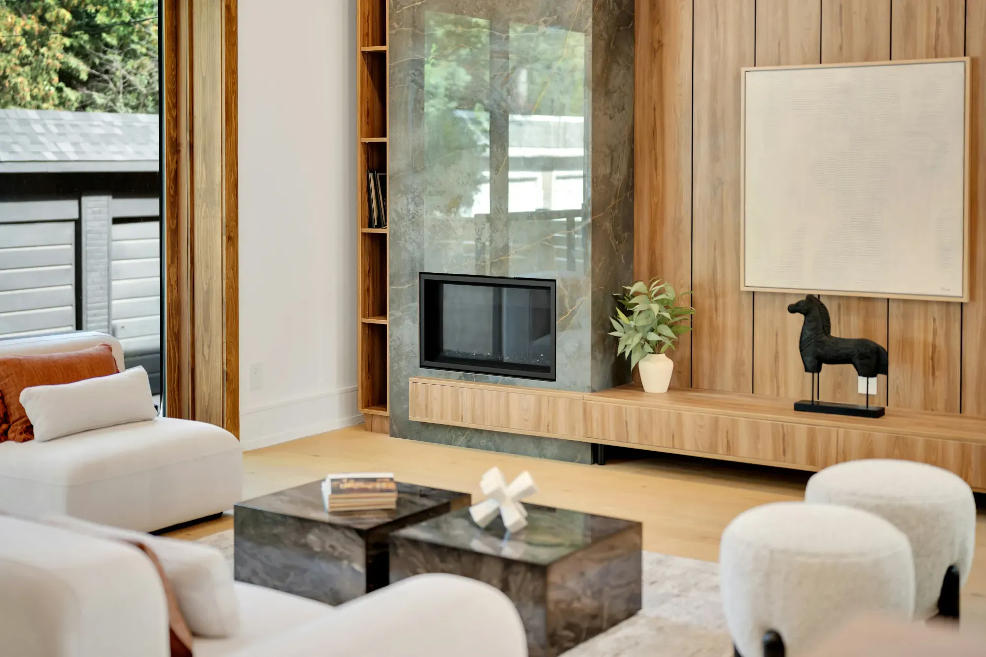 Living area renovation with a modern fireplace focal point
